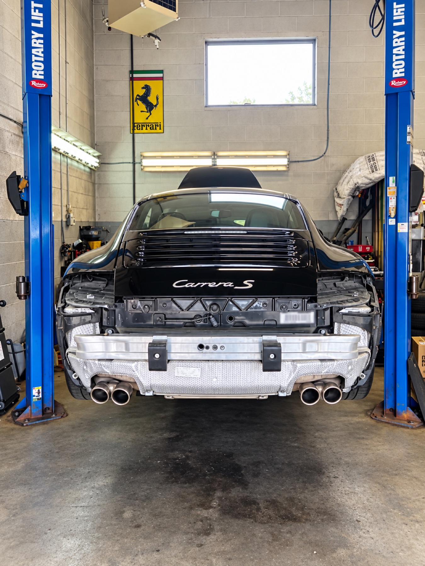 Rear bumper removed during collision repair at Advanced Autoworks